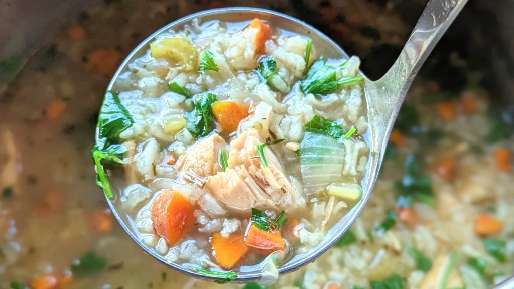pressure cooker chicken rice soup recipe with cooked chicken vegetables and rice