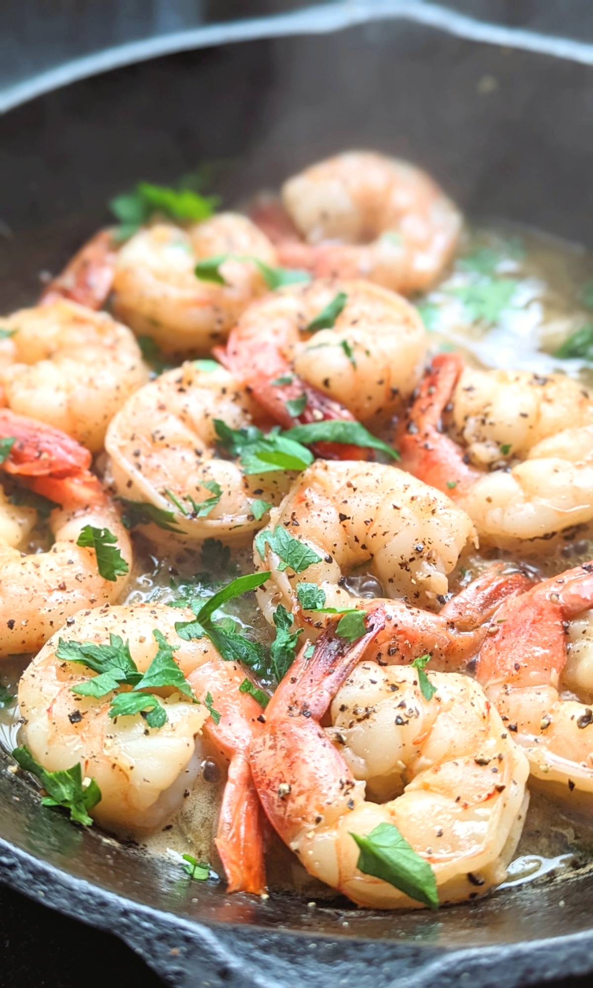 cast iron skillet shrimp recipe with salt and pepper parsley and lemon