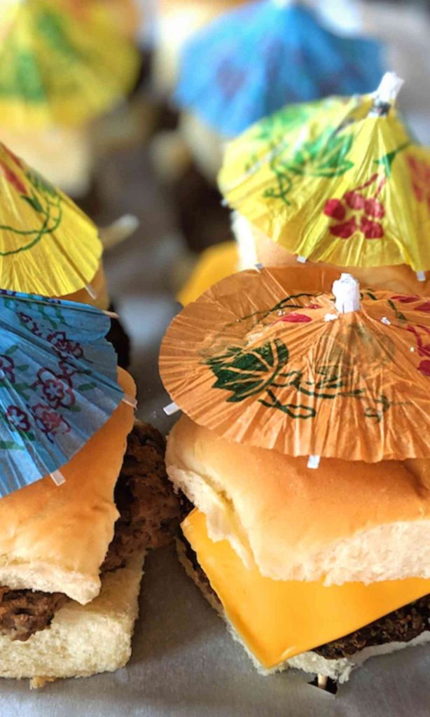 tropical cheeseburger sliders with umbrella toothpicks for hawaiian party margaritaville dinner ideas