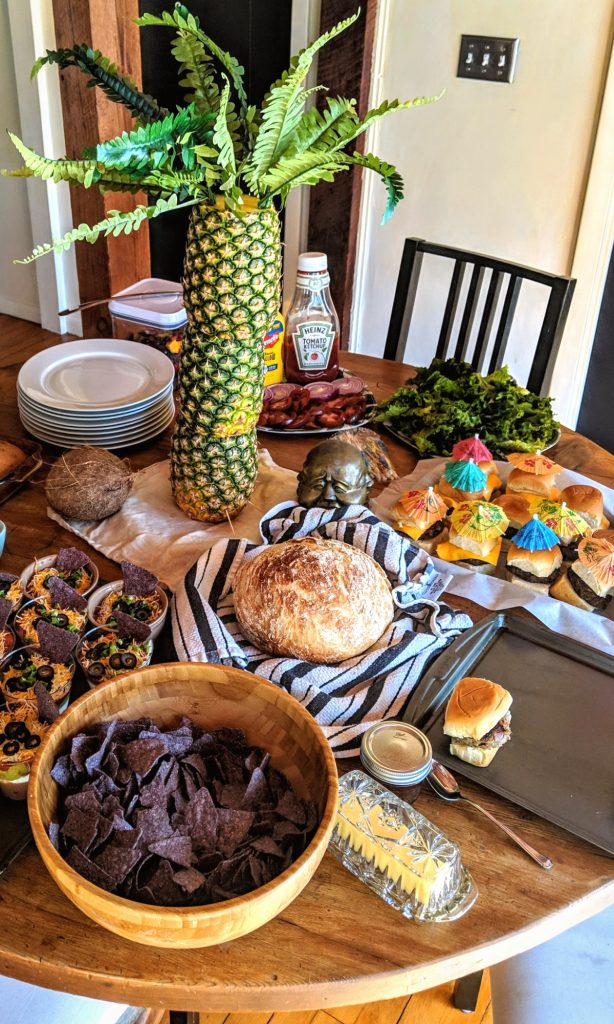 jimmy buffett parrothead party with cheeseburgers in paradise recipe 7 layer dip pineapple trees and chips and salsa