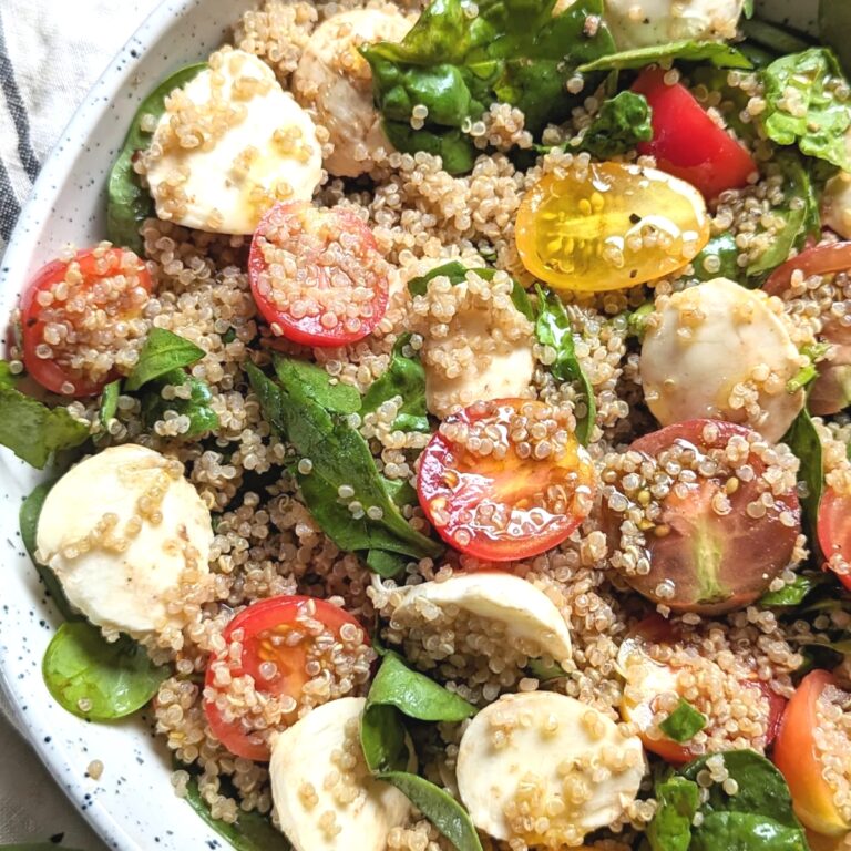 quinoa salad with mozzarella tomatoes and basil with spinach and white quinoa
