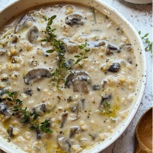 mushroom soup with brown rice recipe and thyme in a bowl