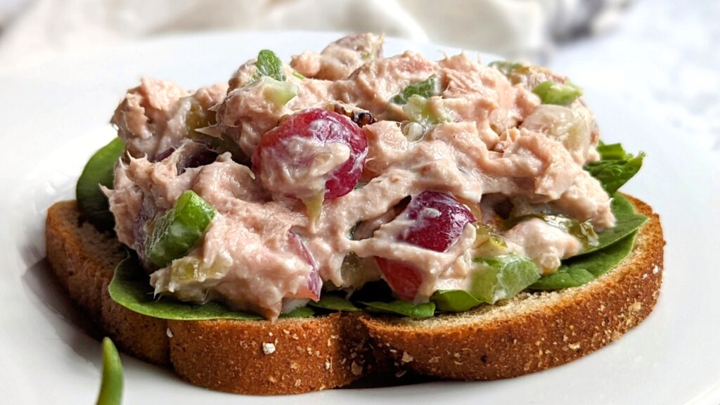 tuna and grape salad recipe sweet fruit and tuna salad on whole wheat toast with greens spinach on a plate