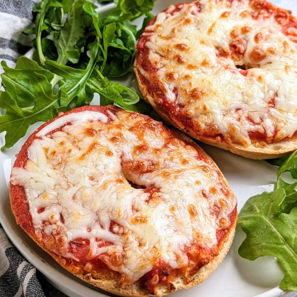 pizza bagels in air fryer recipe with perfect melted cheese over plain bagels with pizza blend cheese and marinara sauce