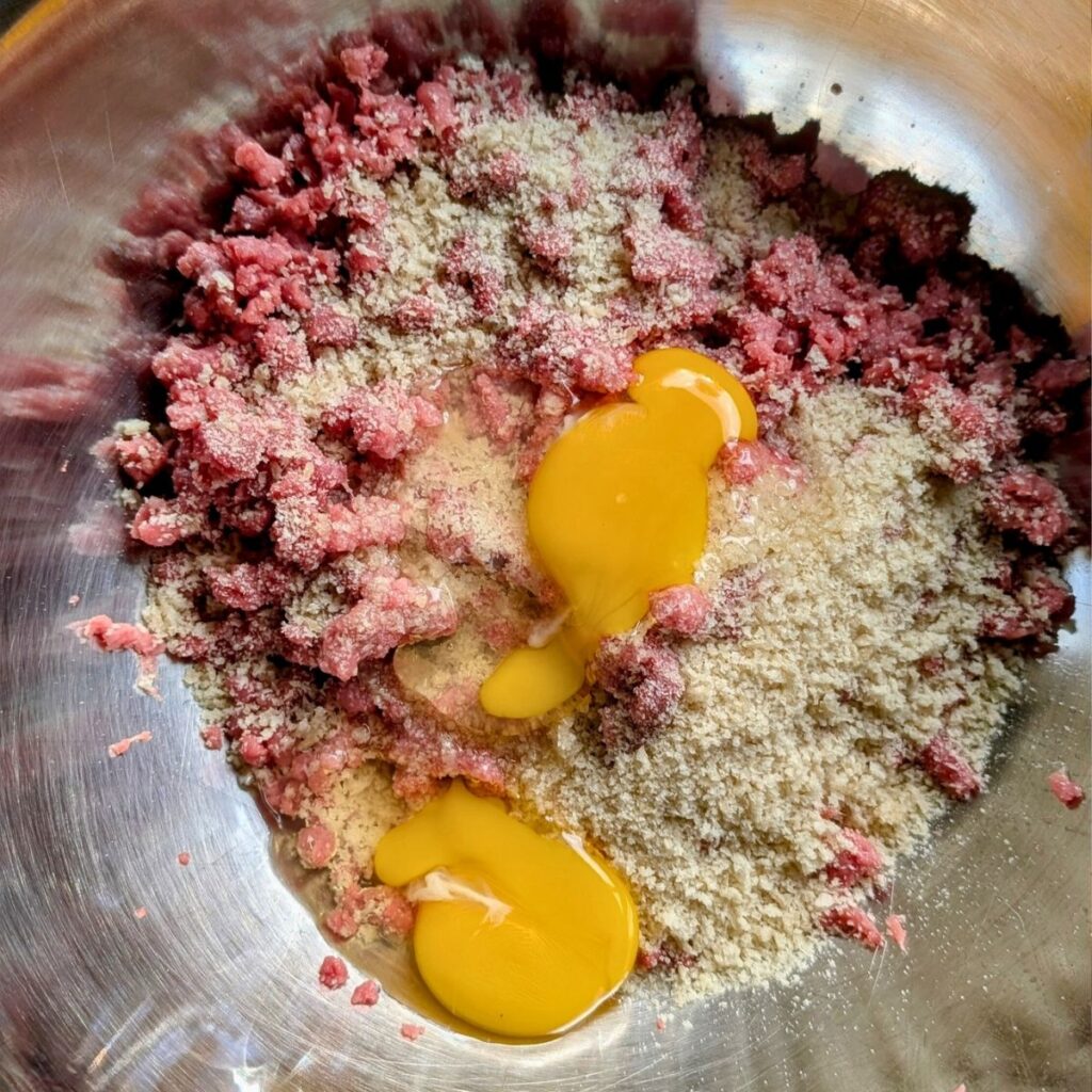 ground brisket mixed with breadcrumbs and eggs to make homemade brisket burgers for the grill.