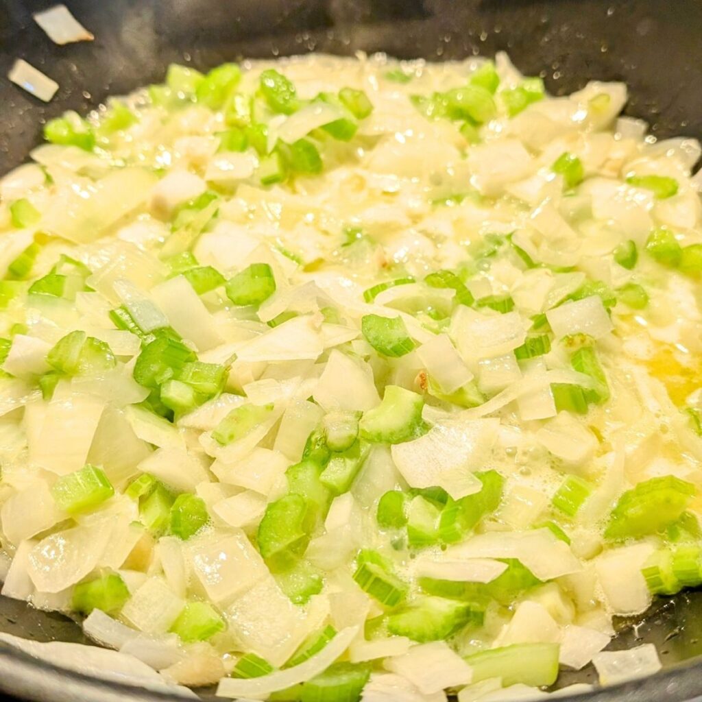 sauteed garlic onions and celery for thanksgiving stuffing with butter and chorizo