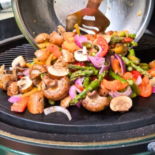 fresh vegetables being grilled on a big green egg kimodo grill