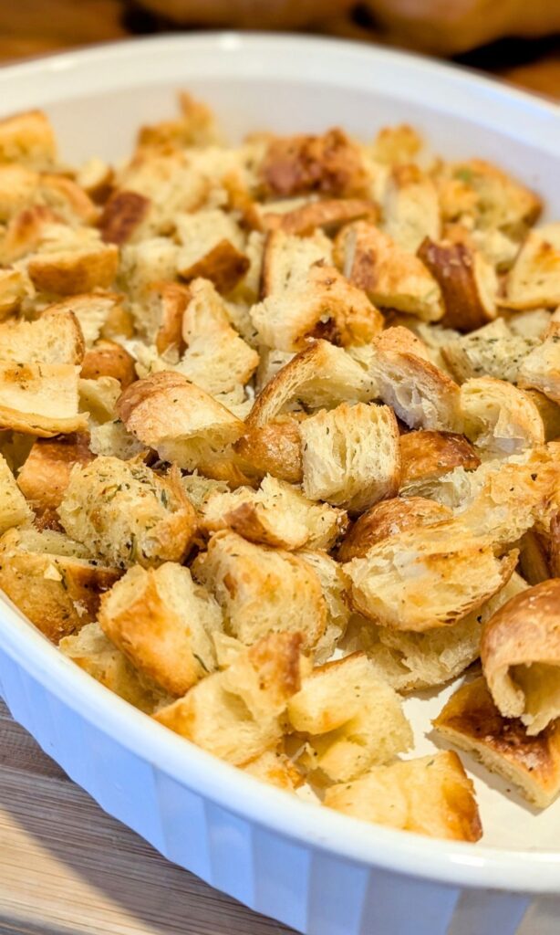 stale croissants in a baking dish and baked until golden brown and crisp on the outside.