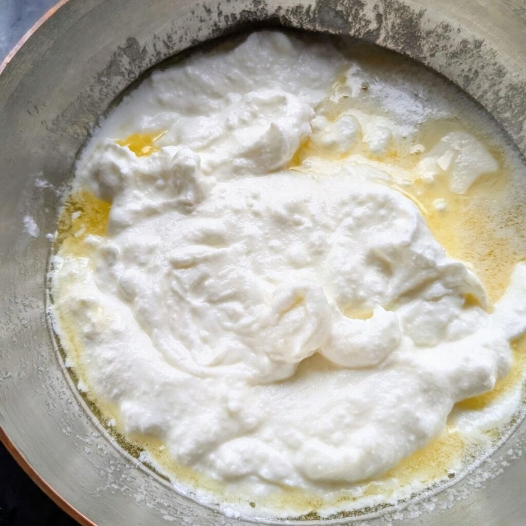 a saucepan of butter and Greek yogurt to make hollandaise sauce without egg yolks