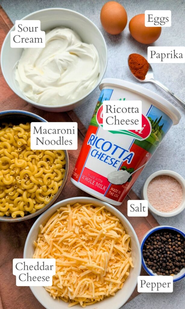 ingredients for the creamiest mac and cheese with ricotta cheese and cheddar and sour cream