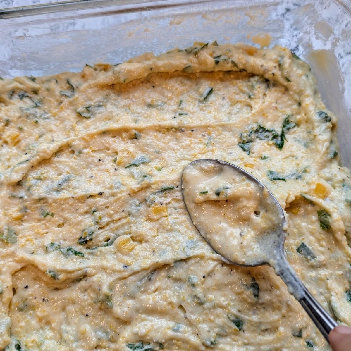 cilantro cornmeal in a bowl to be baked