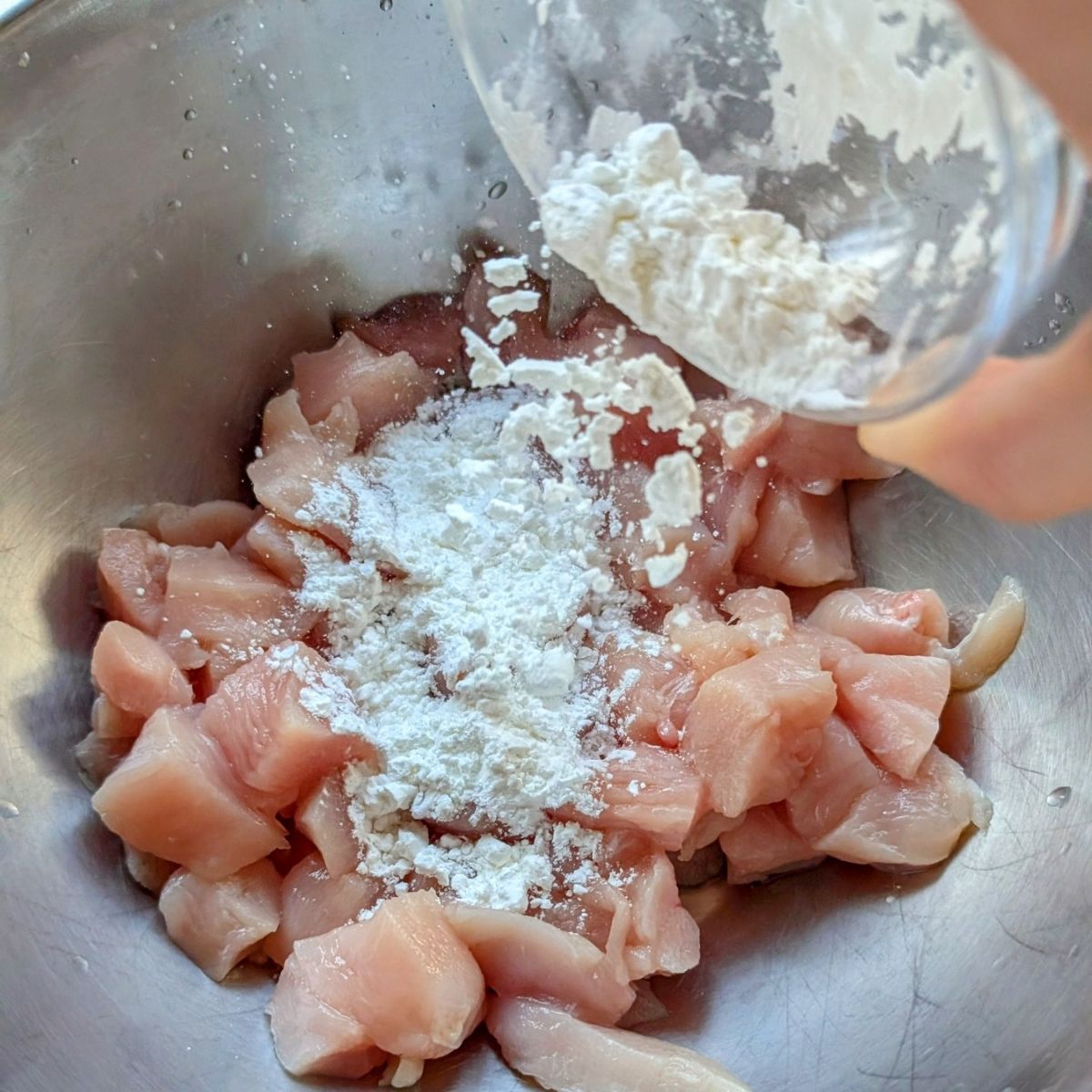 corn starch tossed with chicken to make a crispy coating for the oven