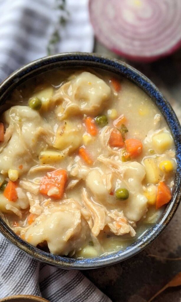 a bowl with chicken and dumplings dairy-free without heavy cream or milk