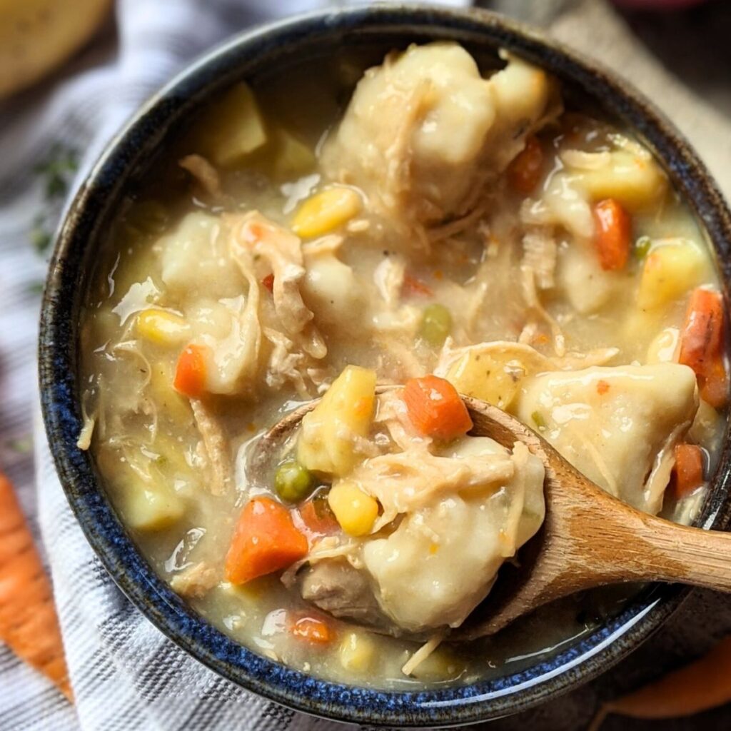 a spoon scooping up fluffy dumplings for a delicious dairy free dinner idea