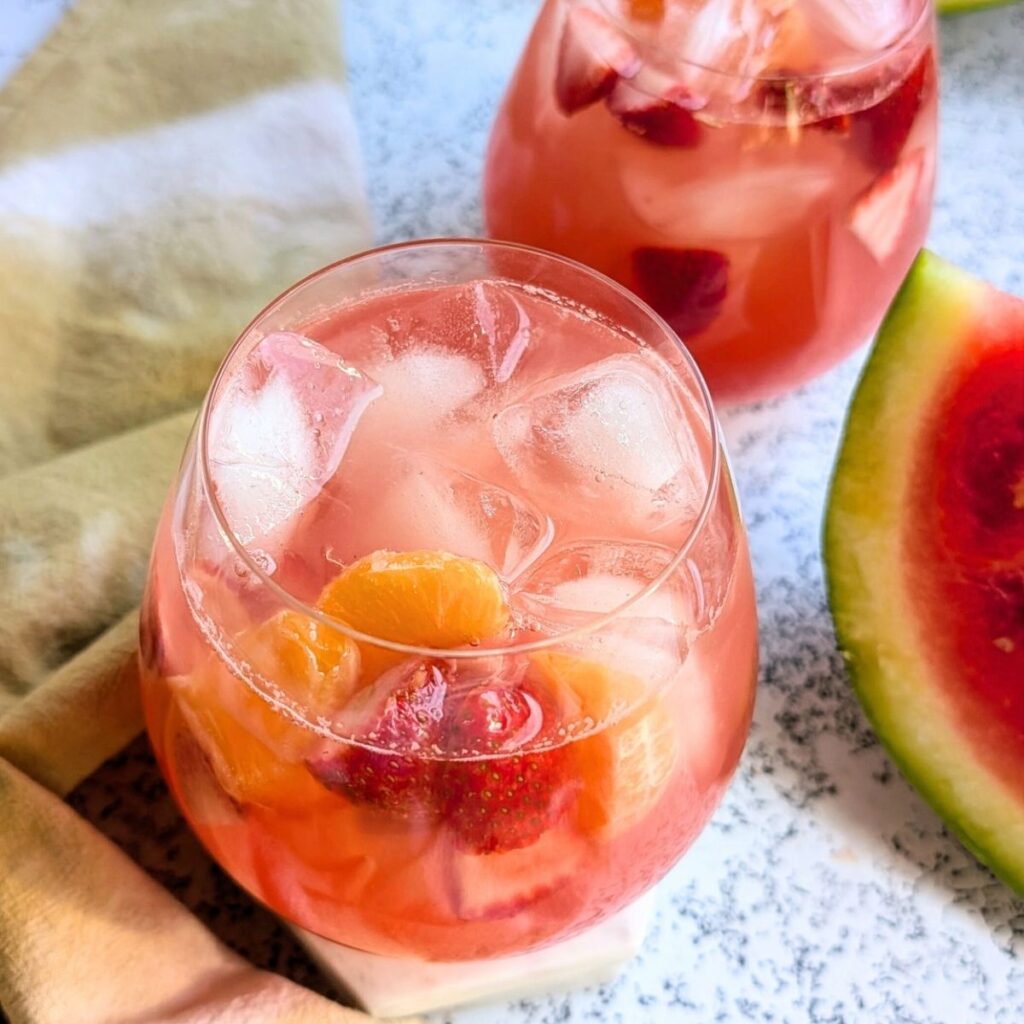 watermelon wine sangria with fresh summer fruit for an easy olive garden copycat recipe for moscato sangria