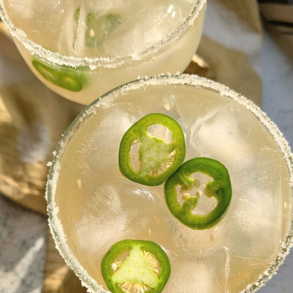 margarita glasses with jalapeno peppers with limeade for a 5 minute batch cocktail for parties