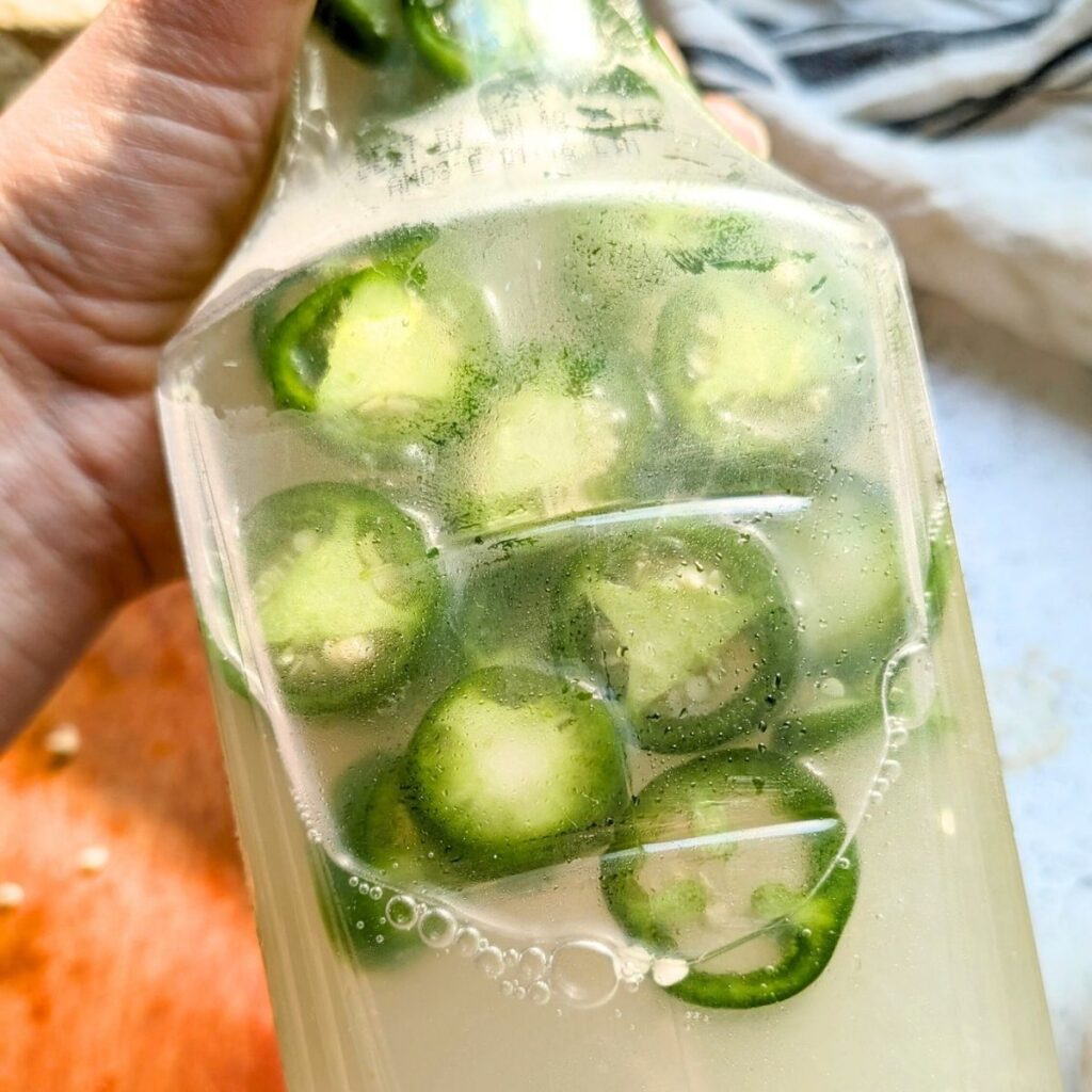 limeade shaken with jalapeno peppers and tequila to make margaritas