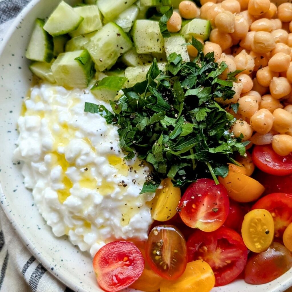 meatless macro bowls with cottage cheese and fresh vegetables with red wine vinaigrette dressing