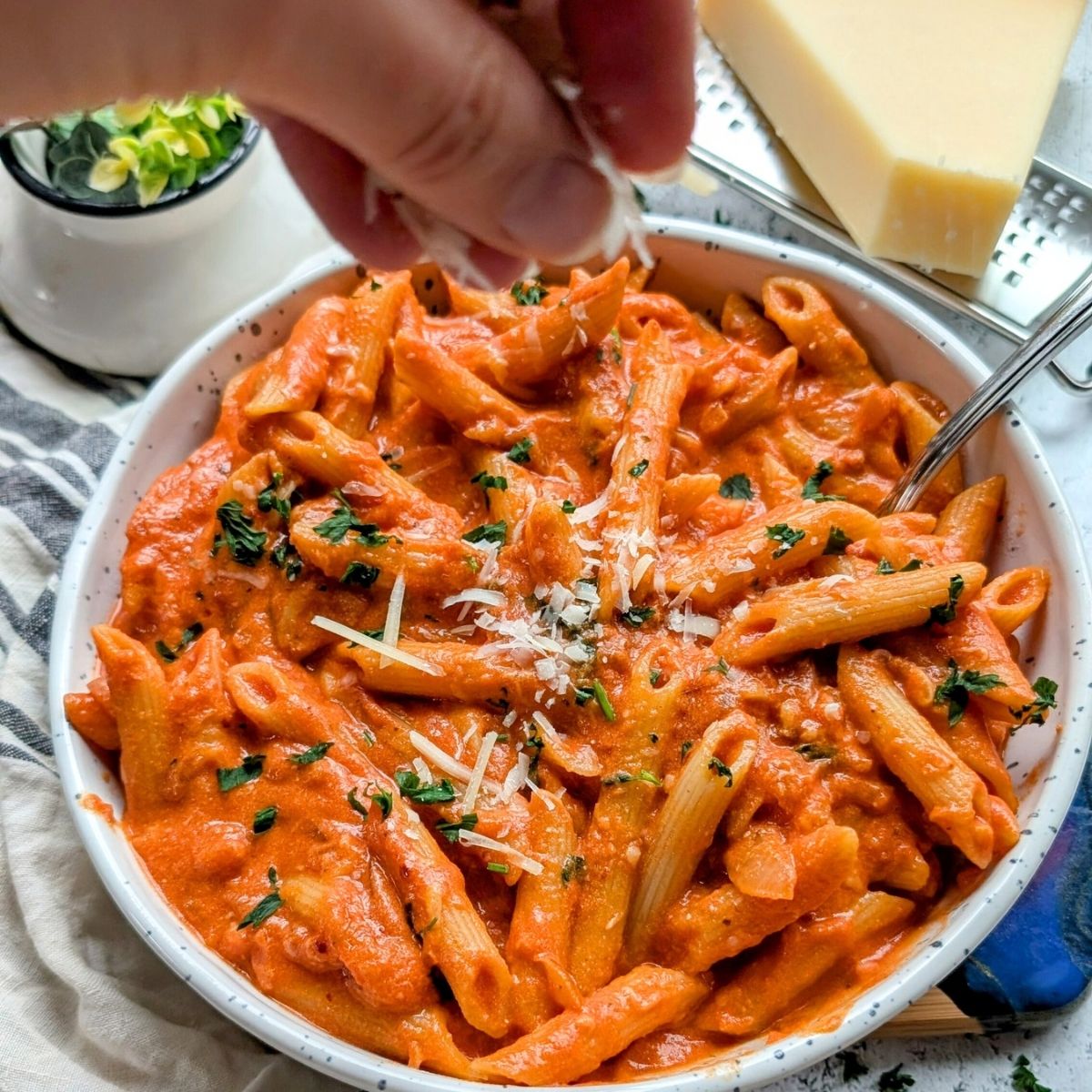 grated parmesan on copycat penne alla vodka recipe