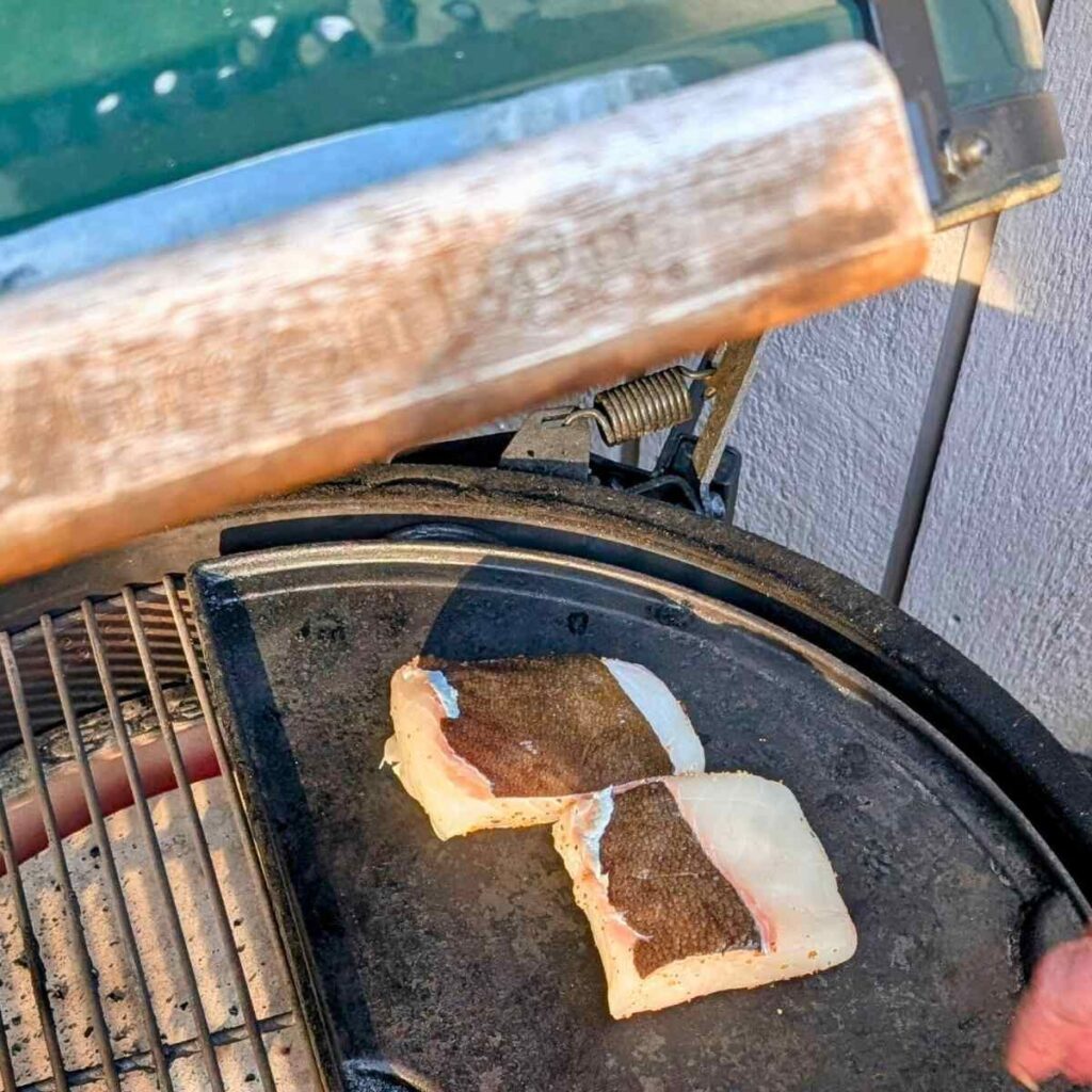 grill halibut fillet skin-side up with spices for a nice sear and char