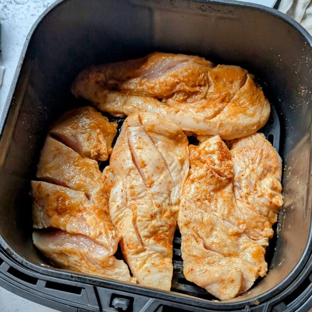 air fryer mango chicken breasts in an single layer for even cooking.