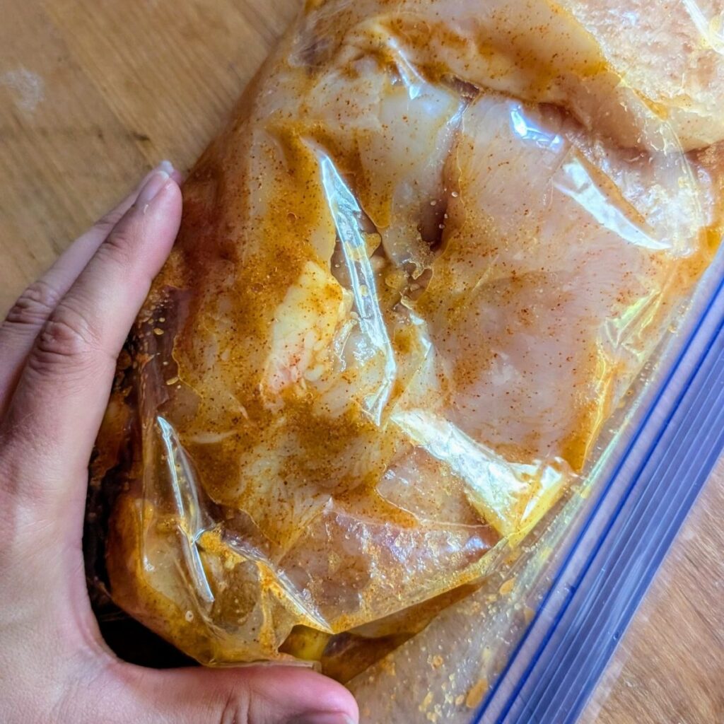 mango lime chicken marinading in a bag overnight.