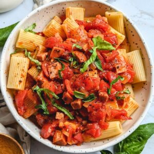 a bowl of chorizo pasta without cheese or cream.