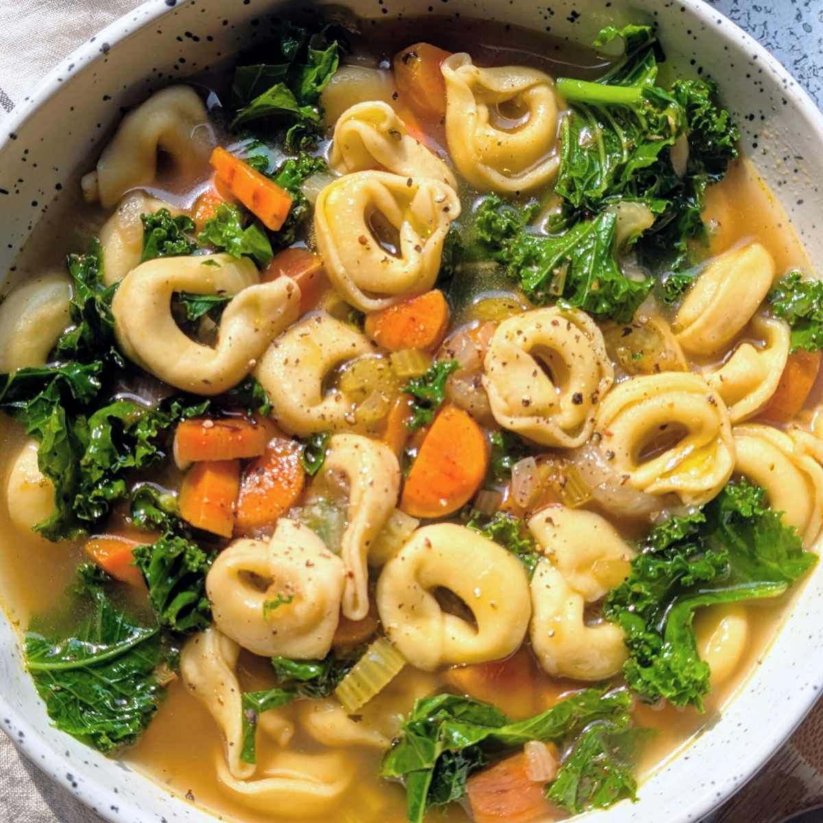 frozen tortellini soup recipe with cheese tortellini, carrots, greens, and vegetable broth.