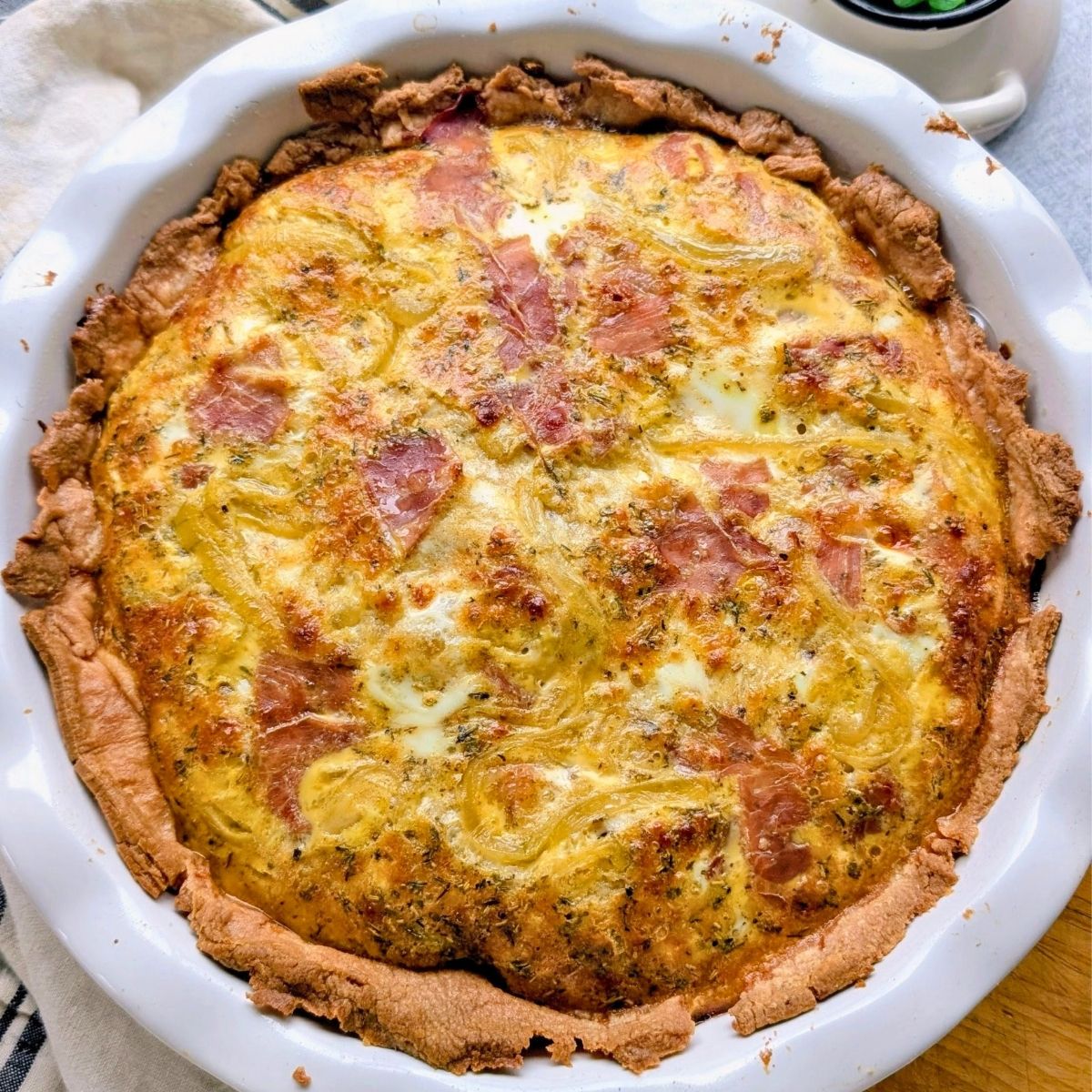 puff pastry quiche lorraine with ham caramelized onions and gruyere cheese