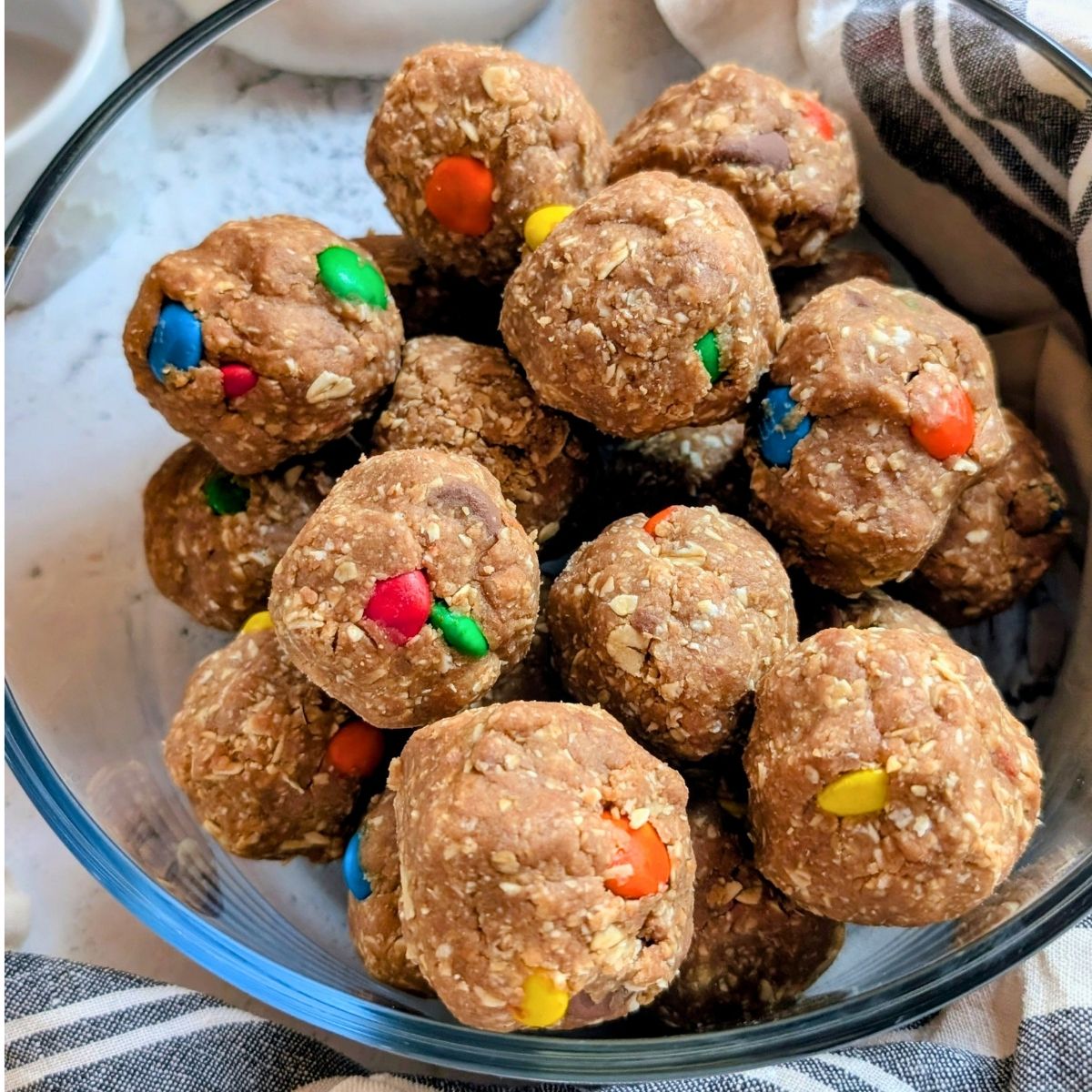 monster cookie protein bites recipe with m and ms chocolate candies and protein powder